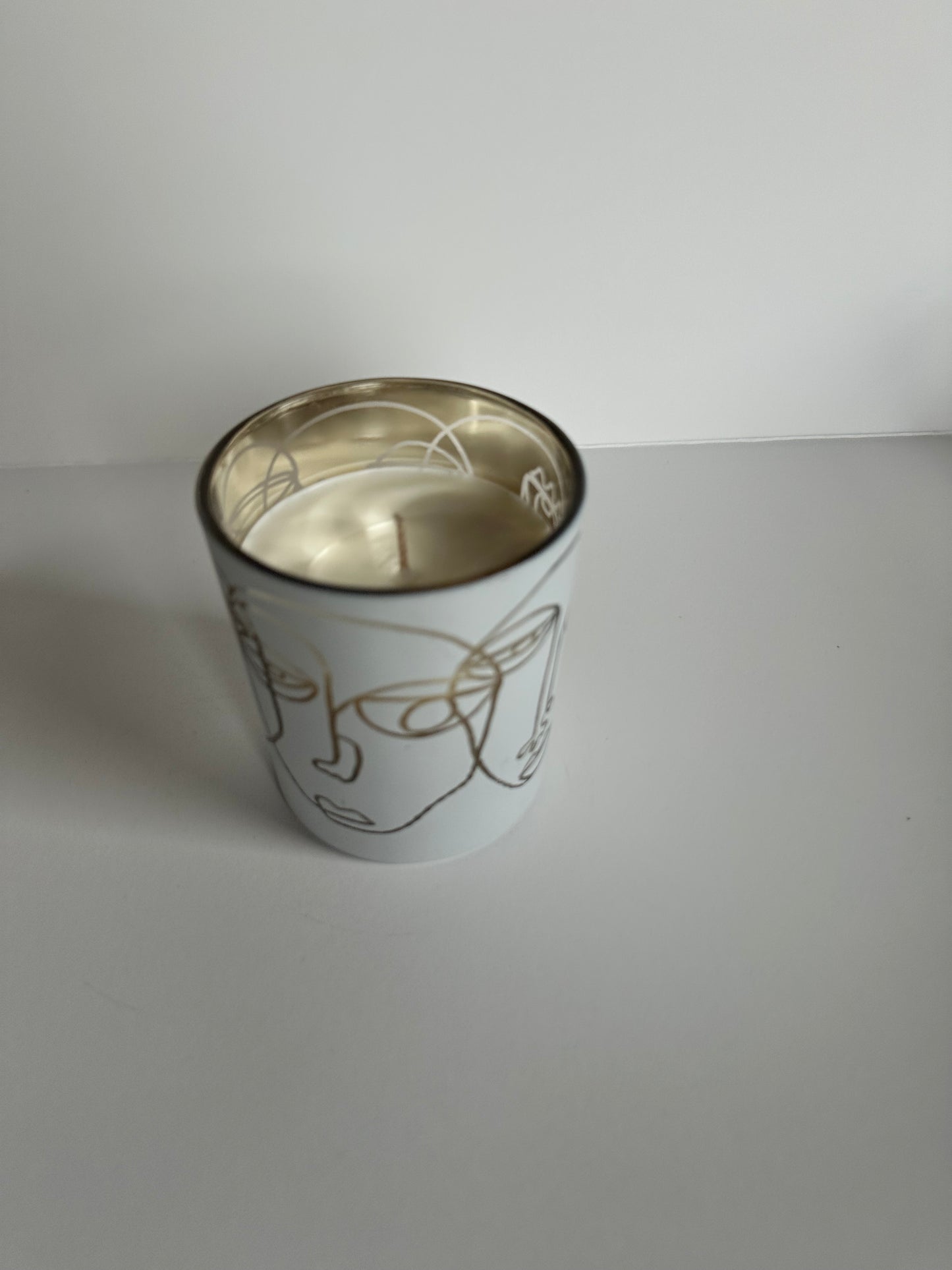 Kerze Gesichter (weißes Glas)